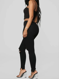 Calça Jeans Skinny Com Rasgos