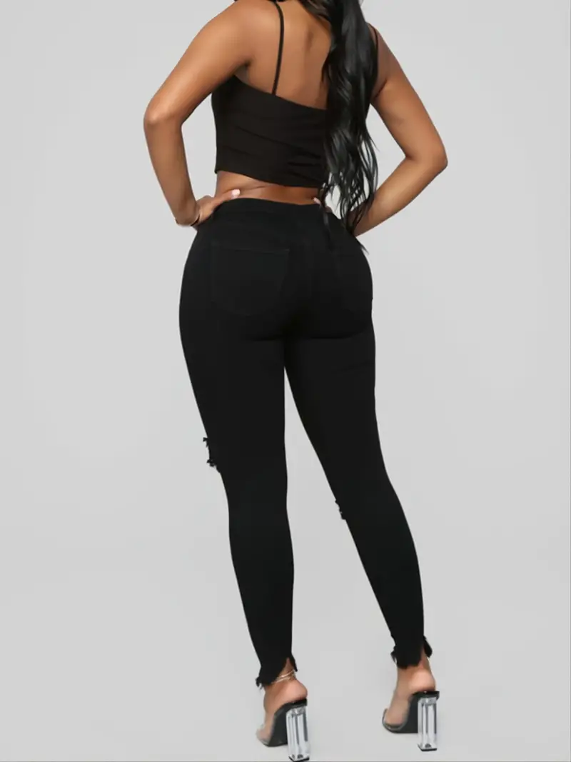 Calça Jeans Skinny Com Rasgos